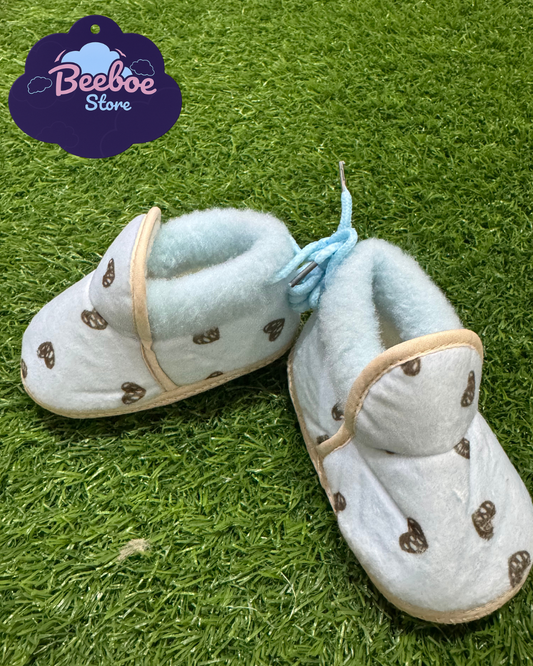 Soft Blue Heart Print Baby Booties – Warm & Snug Fit